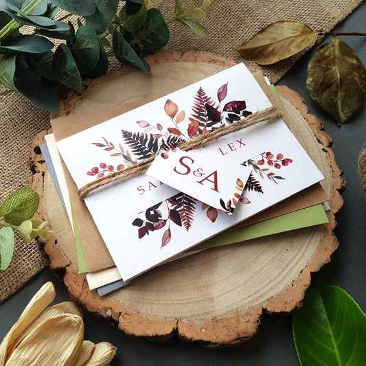 Burugundy hues wedding invitation set with envelopes rustic twine and tags. perfect for an autumn fall wedding