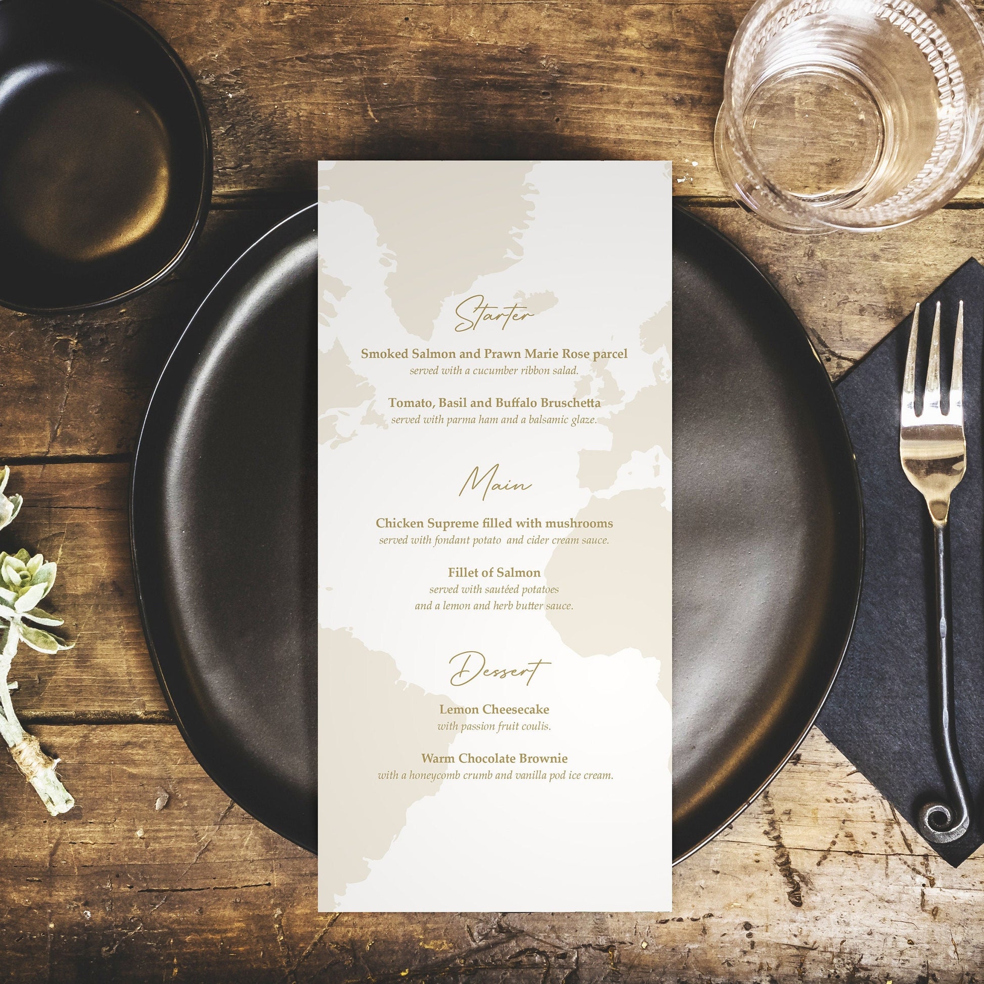 world map wedding menus with gold details matching passport invitations for destination wedding