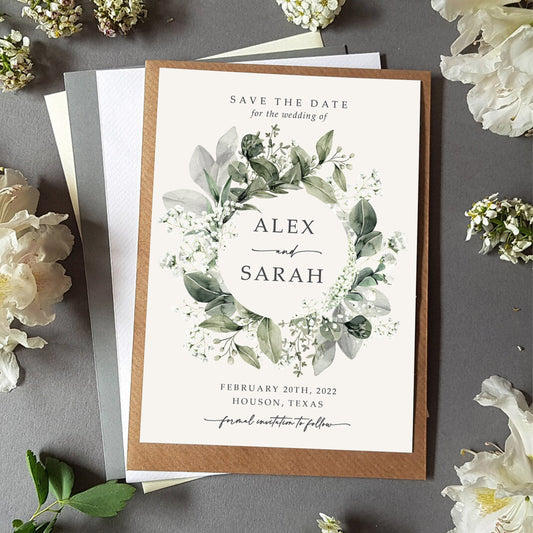 Baby's breath save the date card with a choice of envelopes featuring an array of gypsophila and eucalyptus greenery in a wreath
