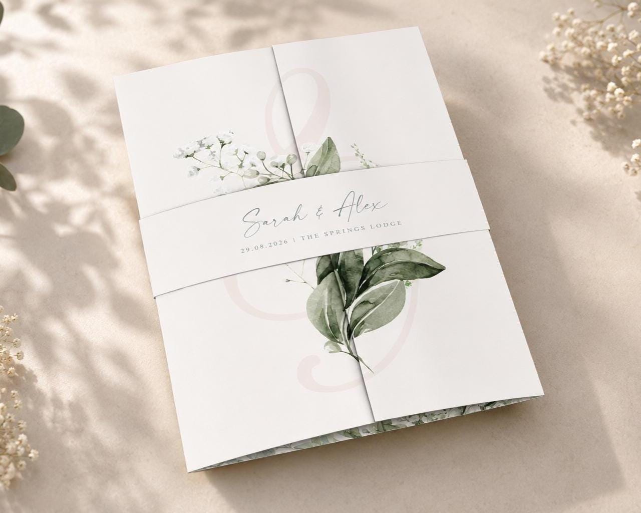 baby breath wedding invitation on a gatefold design with a belly band and envelopes, elegant gypsophila border with order of day, menu and RSVP details