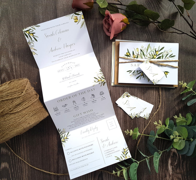 Olive wedding invitations in a concertina style with rustic twine, personalised tags and a choice of envelopes. Perfect for a wedding abroad in cyprus, mediterranean