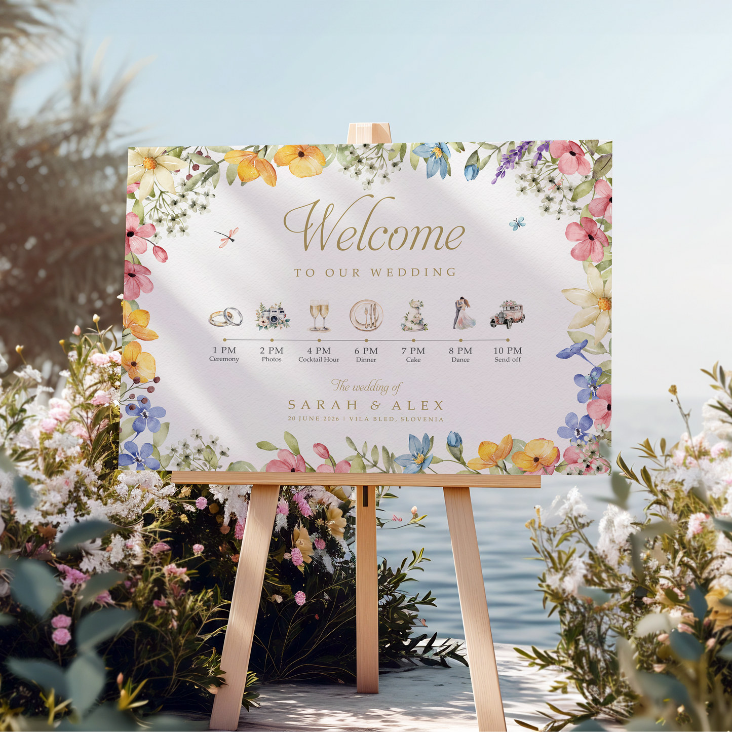 Wedding welcome sign on an easel with colourful flower decorations