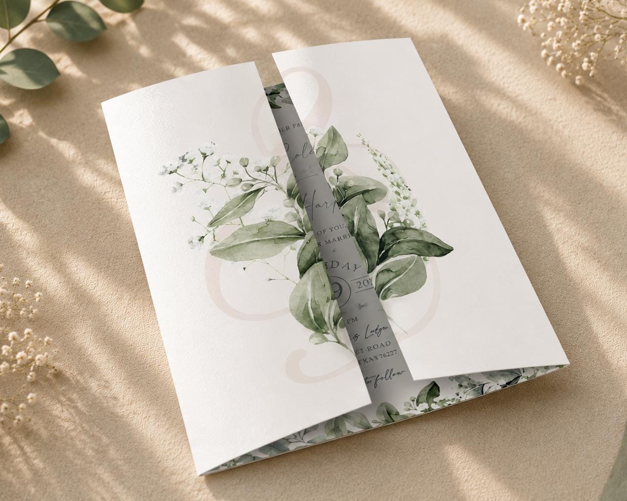 baby breath wedding invitation on a gatefold design with a belly band and envelopes, elegant gypsophila border with order of day, menu and RSVP details
