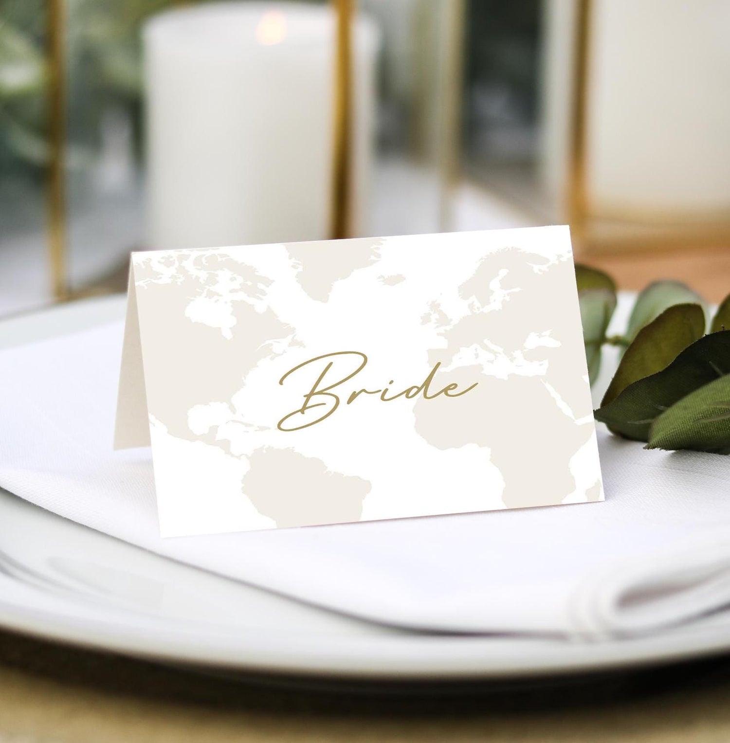 passport world map place cards in gold name settings for weddings