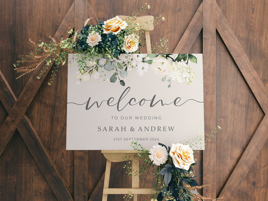 White floral welcome wedding sign printed on an A1 board ready to place on an easel