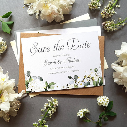 White floral save the date cards