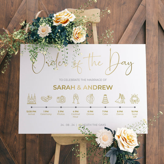 Gold order of the day welcome wedding sign with timeline icons and couples names