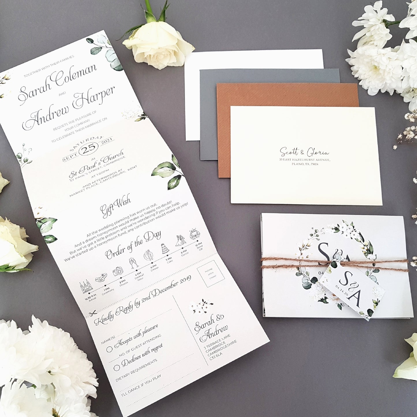 Wedding invitation set featuring an array of white florals with greenery complete with personalised tag, rustic twine and a choice of envelopes. Wedding invite come as a 4 panel concertina printed double sided with gift poem, menu, menu choices and finer details.